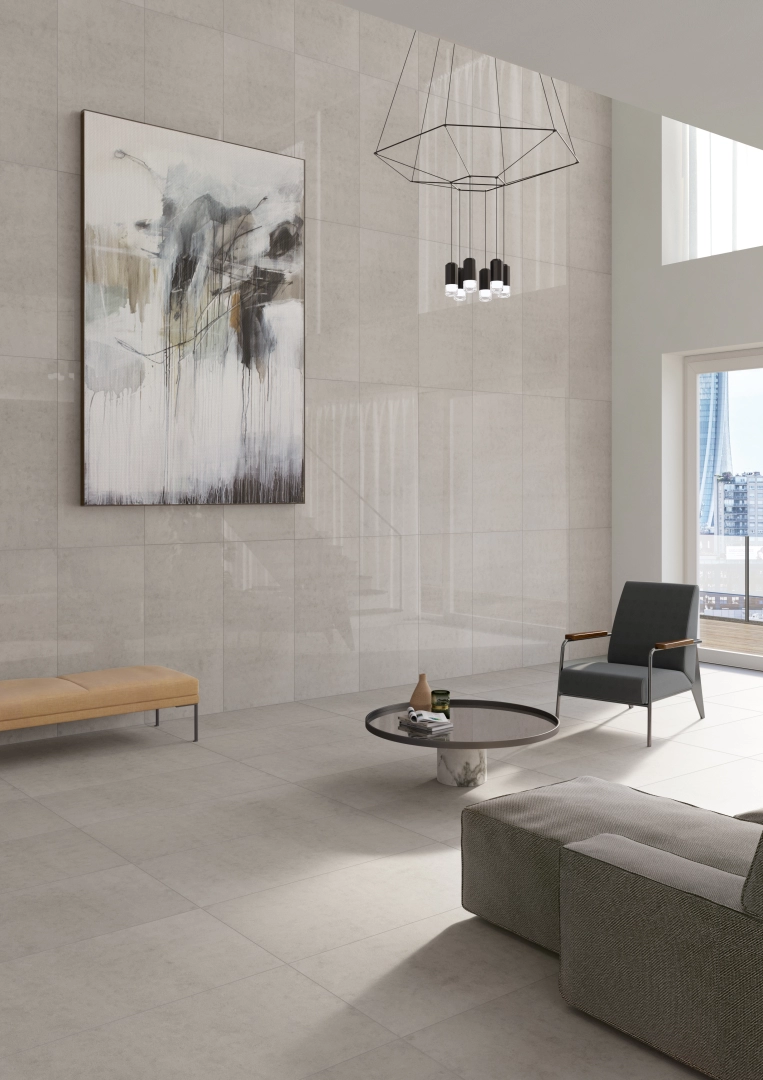Gres Casalgrande Padana TIMELESS efekt beton - aranzacja w strefie dziennej z duzymi przeszkleniami