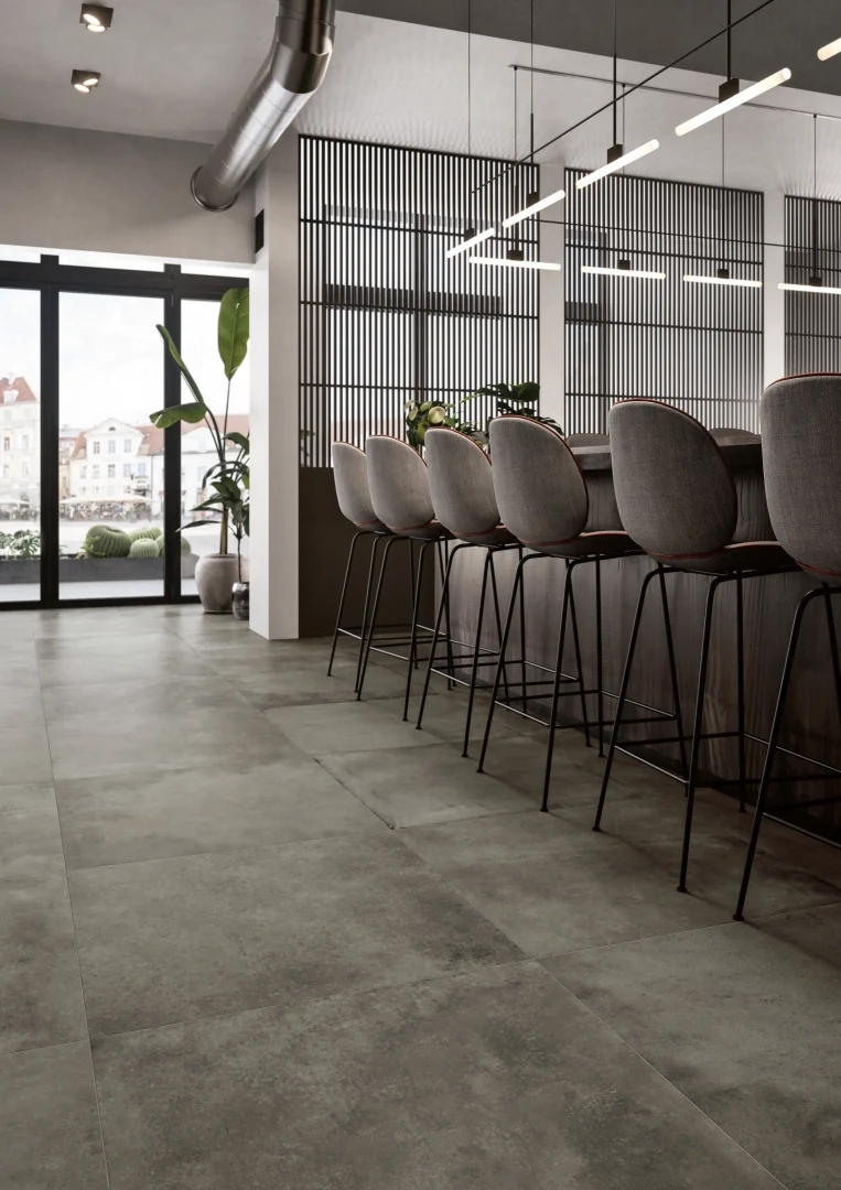 Gres Casalgrande Padana MANHATTAN efekt beton - aranzacja w strefie dziennej z duzymi przeszkleniami