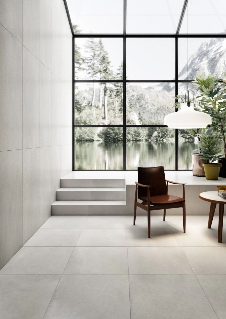 Gres Casalgrande Padana R-EVOLUTION efekt beton - aranzacja w przy kominku