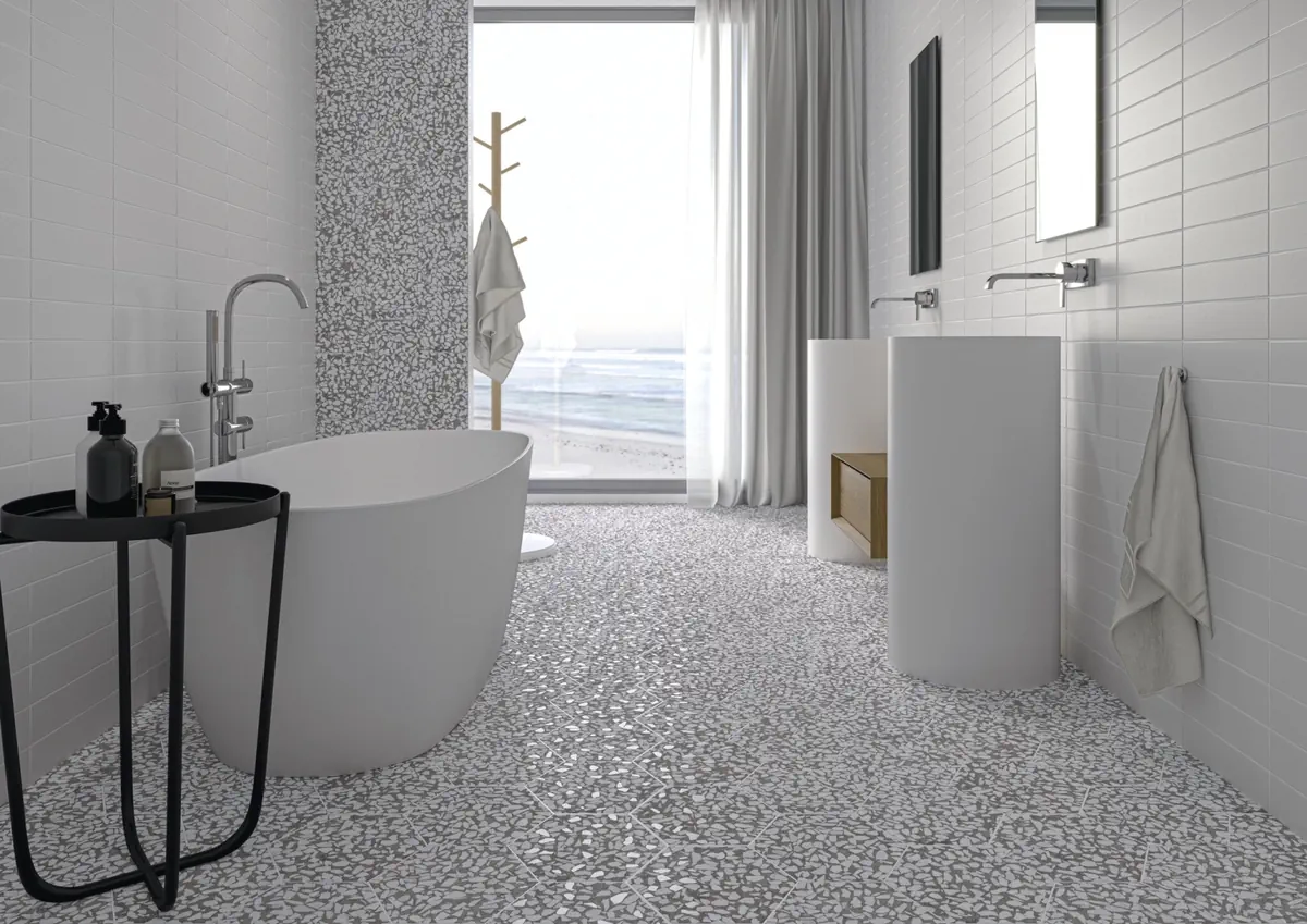 Gres Cifre RIAZZA efekt terrazzo - aranzacja w strefie dziennej z duzymi przeszkleniami