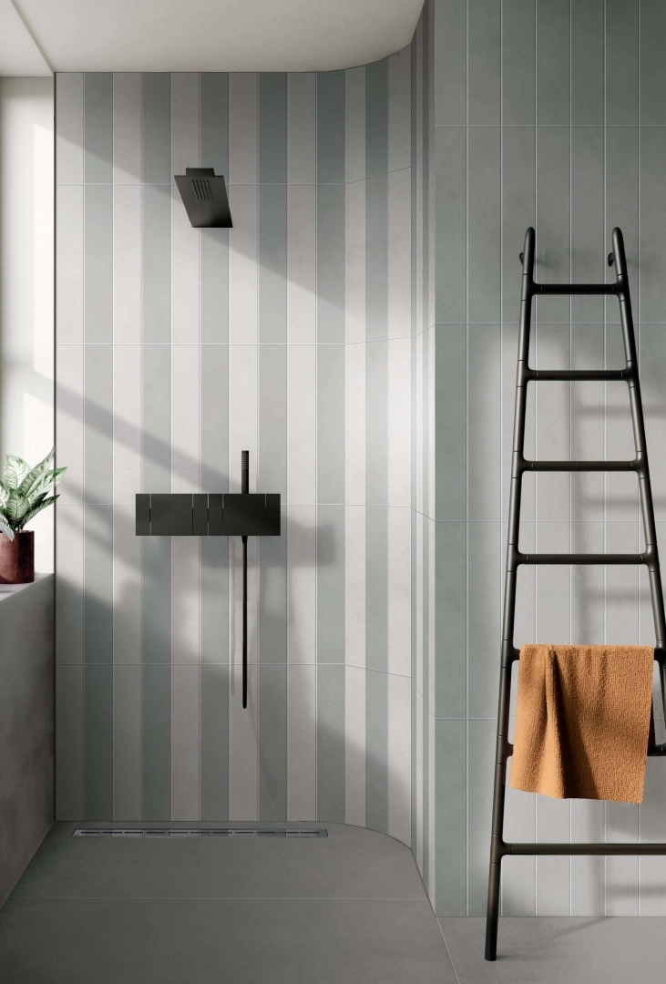 Gres Flaviker PALETTE efekt beton - aranzacja w strefie dziennej z duzymi przeszkleniami