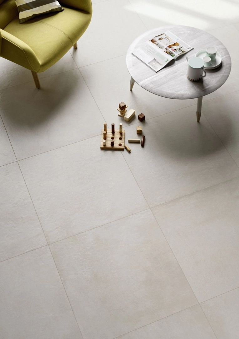 Gres Marazzi PLASTER efekt beton - aranzacja w przy kominku