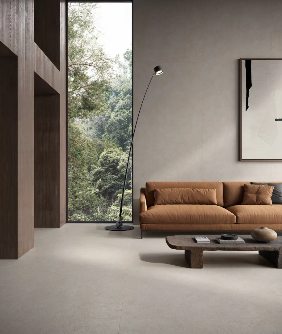 Gres Piemme CEMENT VIBES efekt beton - aranzacja w strefie dziennej z duzymi przeszkleniami