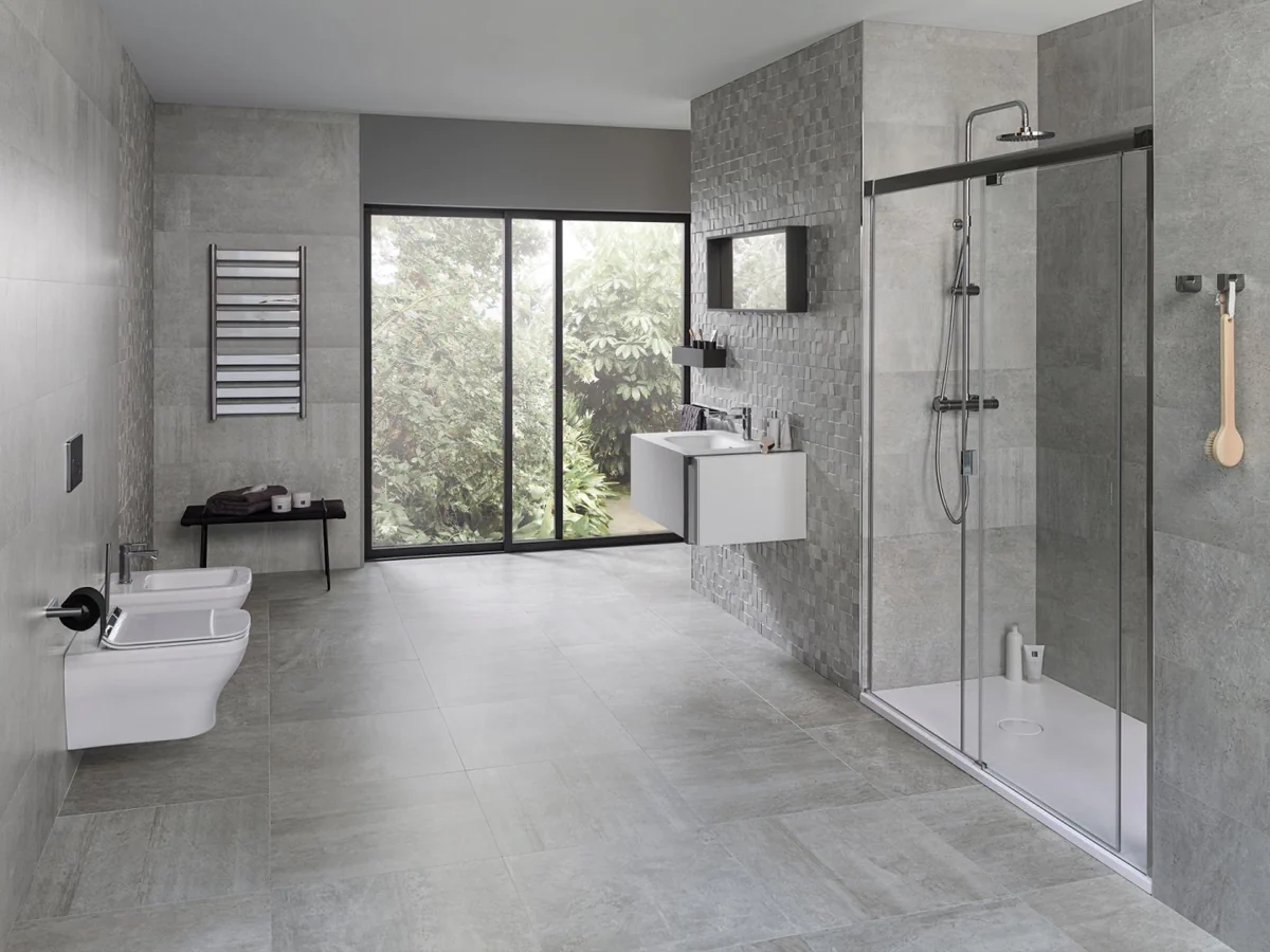 Gres Porcelanosa RODANO efekt beton, kamień - aranzacja w strefie dziennej z duzymi przeszkleniami