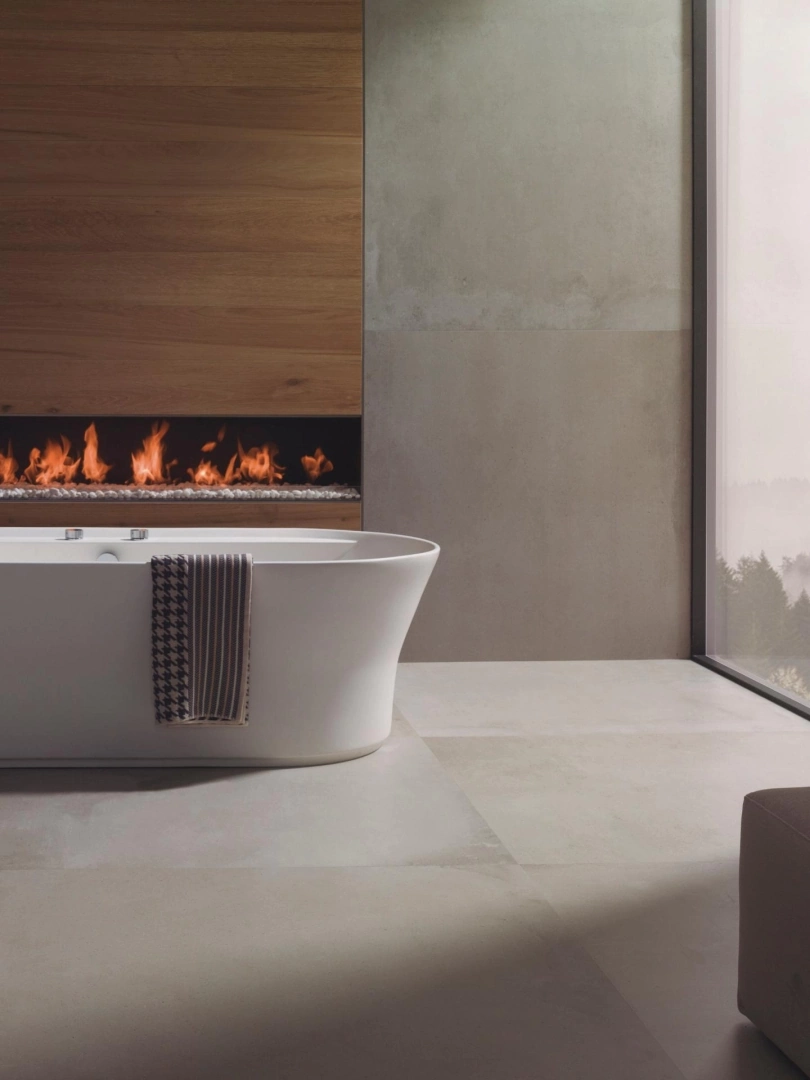 Gres Porcelanosa HARLEM efekt beton - aranzacja w przy kominku