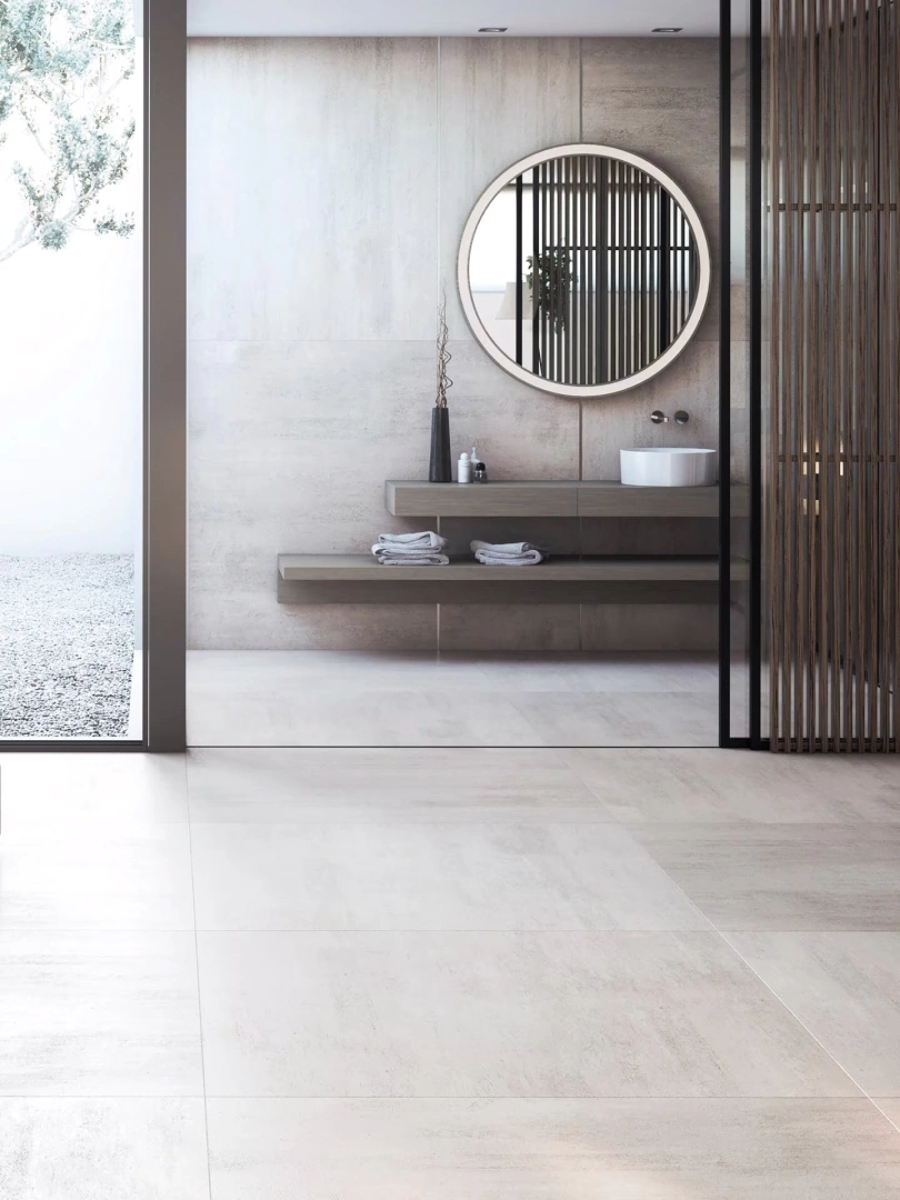Gres Porcelanosa NANTES efekt beton - aranzacja w strefie dziennej z duzymi przeszkleniami