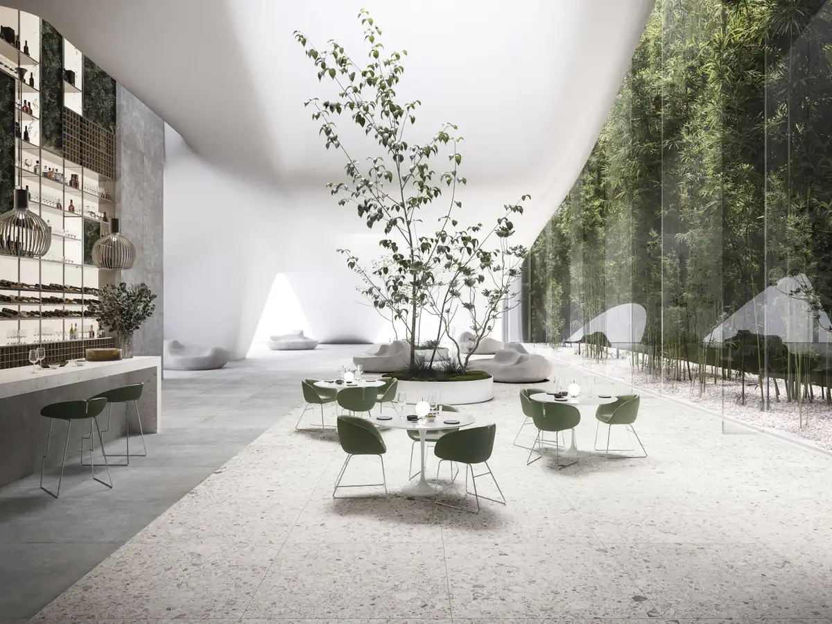 Gres Refin OROBICA efekt terrazzo - aranzacja w korytarzu z naturalnym swiatlem
