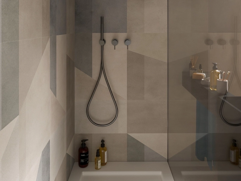 Płytki gresowe Marazzi Alchimia efekt beton w eleganckim salonie z dużymi przeszkleniami